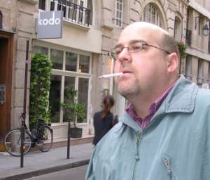 David Louis Edelman smoking a cigarette in Paris