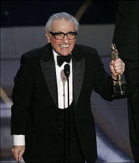 Martin Scorsese holding an Oscar